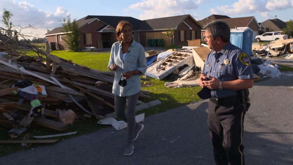 PHOTO: Robin Roberts walks around Lake Charles with Sheriff Tony Mancuso to see the devastation after the hurricanes.