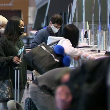 VIDEO: Americans headed home for holiday despite the warnings