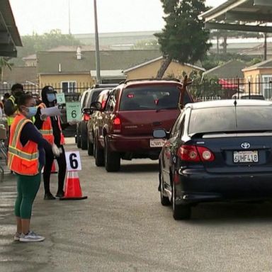 VIDEO: Economic fallout from pandemic prompts huge lines at food bank