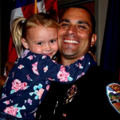 VIDEO: Officer adopts little girl he comforted while on duty