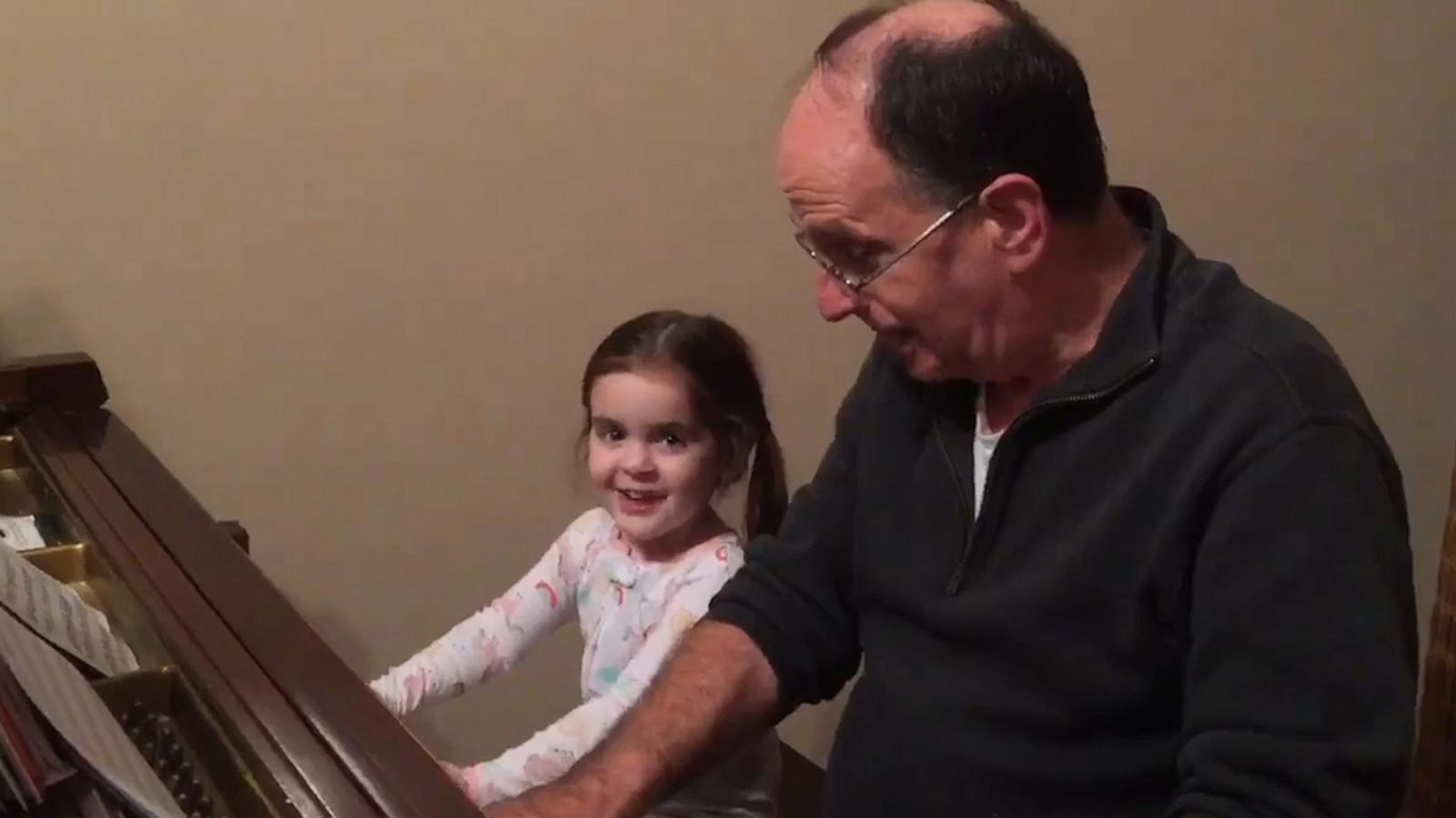 VIDEO: Musician grandpa bonds with granddaughter through sweet tunes