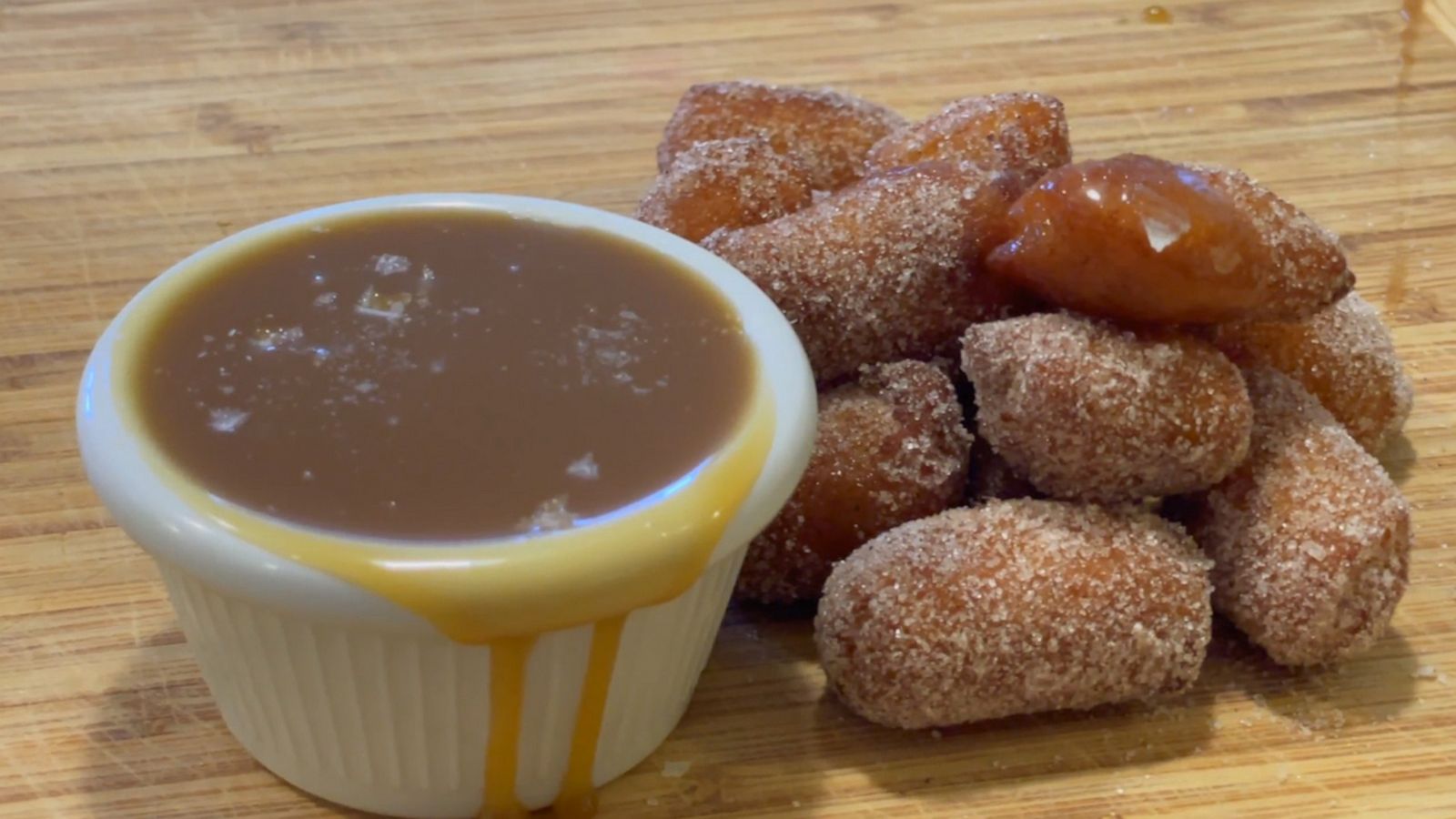 VIDEO: Dunk these apple cider churro poppers into a salty-sweet homemade caramel sauce