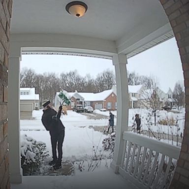 VIDEO: Neighbors team up to shovel snow for new parents 