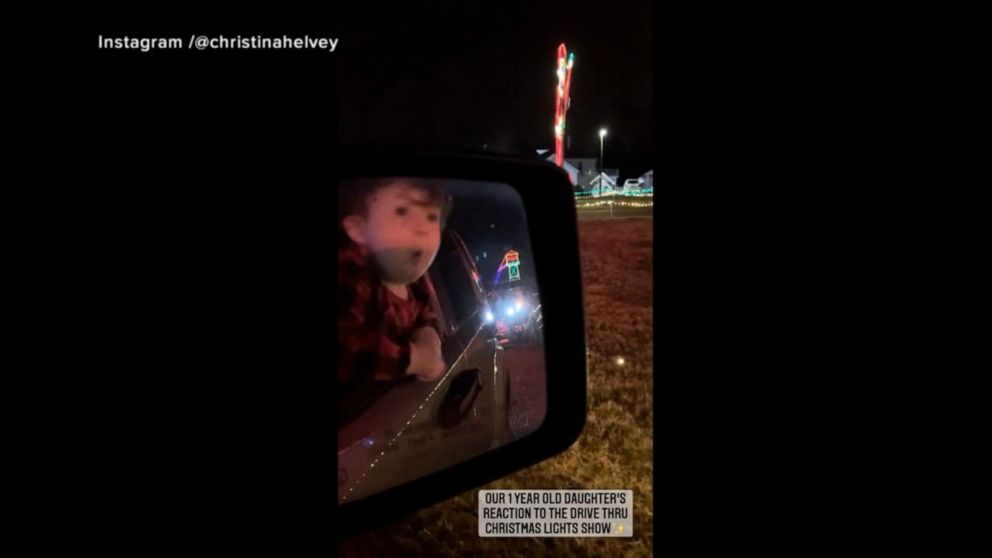 VIDEO: Toddler delighted by Christmas lights display