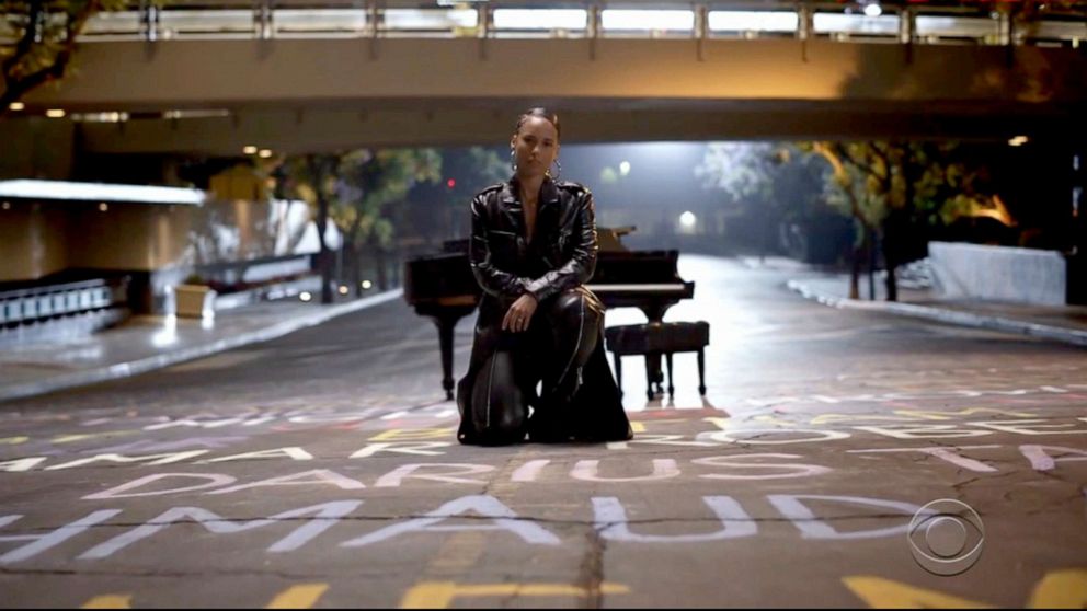 PHOTO: In this video grab issued Sunday, June 28, 2020, by BET, Alicia Keys, standing atop names of Black lives lost, performs during the BET Awards. 