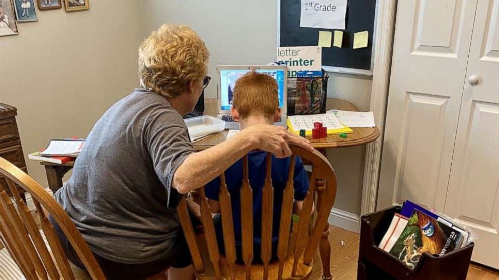 PHOTO: Oliver Levitan attends first grade remotely with the help of his grandmother. 