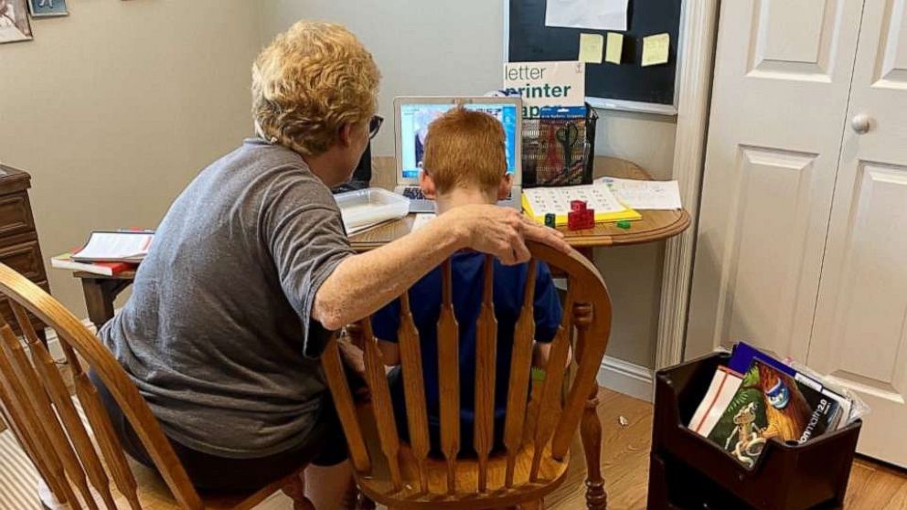 PHOTO: Oliver Levitan attends first grade remotely with the help of his grandmother.