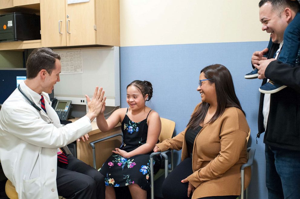 PHOTO: Dr. Brian Skotko in clinic. 