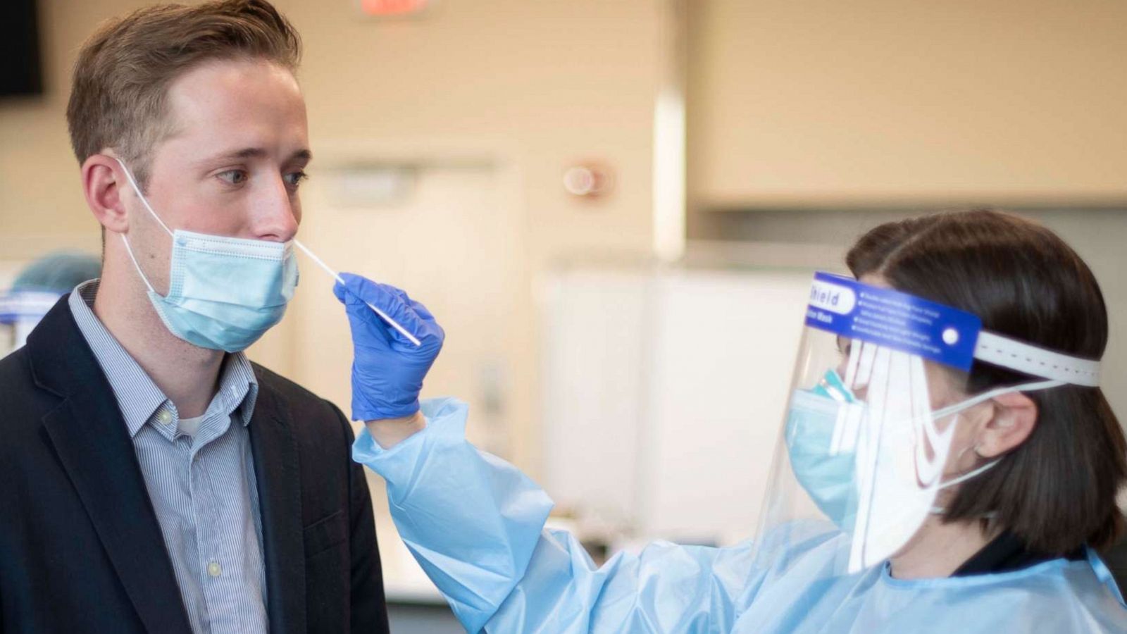 PHOTO: United passengers and crew received rapid COVID tests prior to boarding a Newark to London flight on Nov. 16, 2020.