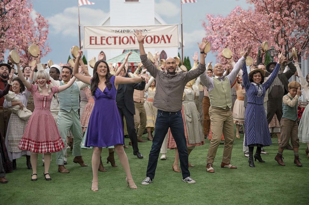PHOTO: Cecily Strong and Keegan-Michael Key perform with the cast of “Schmigadoon!”.