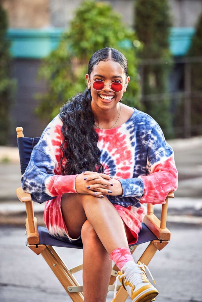 PHOTO: H.E.R. sports Americana look during Old Navy TV spot.