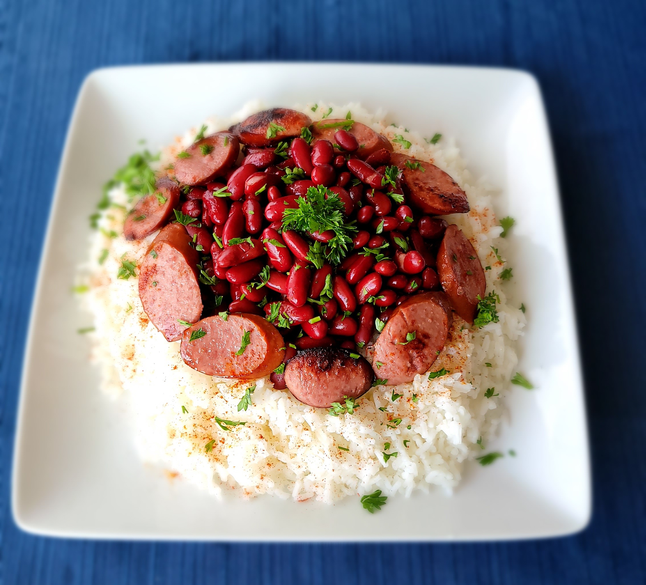PHOTO: A plate of red beans and rice with sausage.