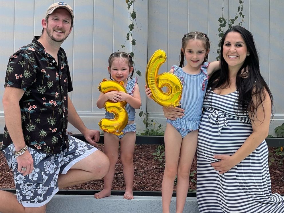 PHOTO: Kristin and Nick Lammert pose with their girls Giuliana (left) and Sophia (right) at their joint birthday party in Aug. 2021.