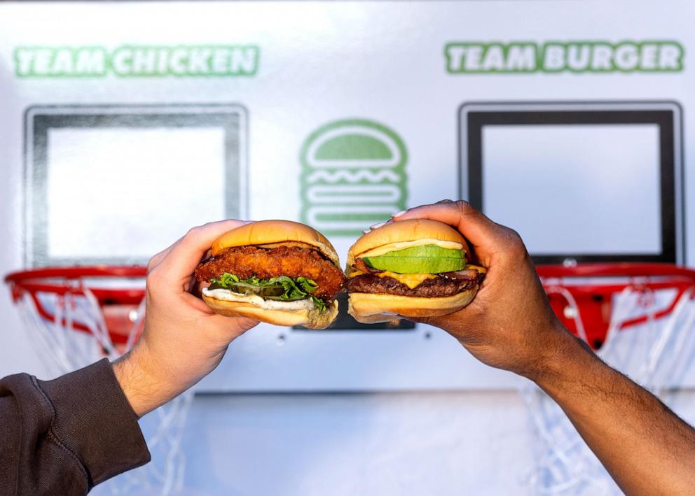 PHOTO: A crispy Chick'n Shack next to an Avocado Bacon Burger from Shake Shack.