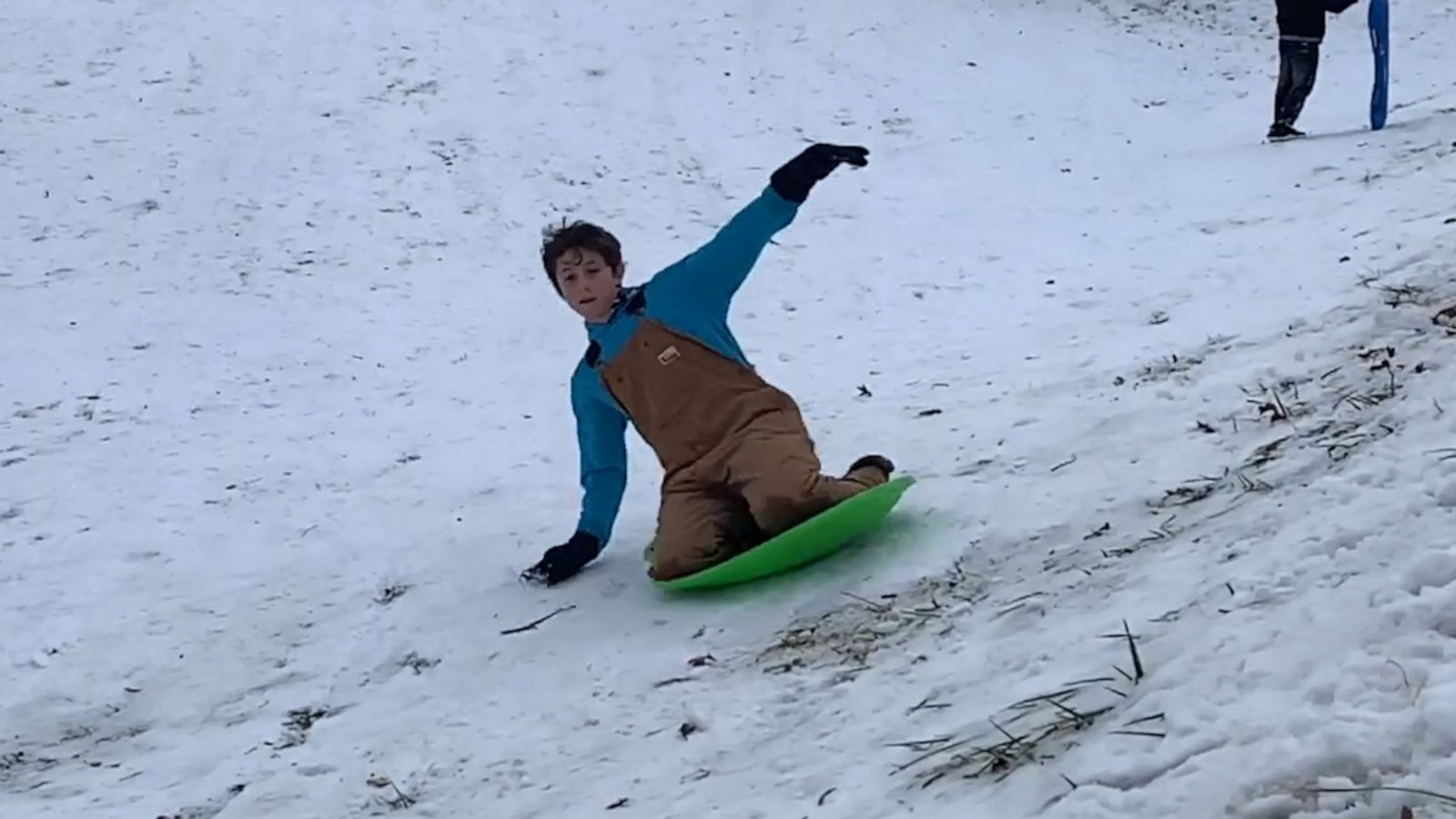 VIDEO: Kids and parents fly through the snow in a winter wonderland