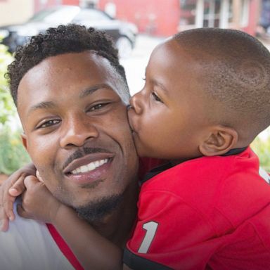 VIDEO: Dancing duo encourages families to embrace the bond between father and son 