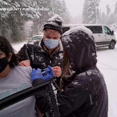 VIDEO: Drivers stranded in snowstorm get leftover COVID-19 vaccines