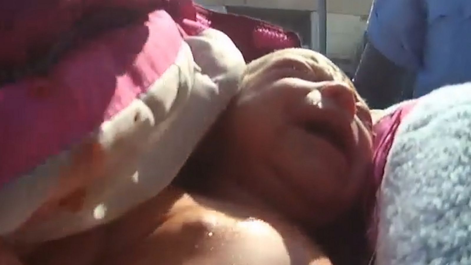 VIDEO: Police officers help mom who just delivered baby in car outside local hospital