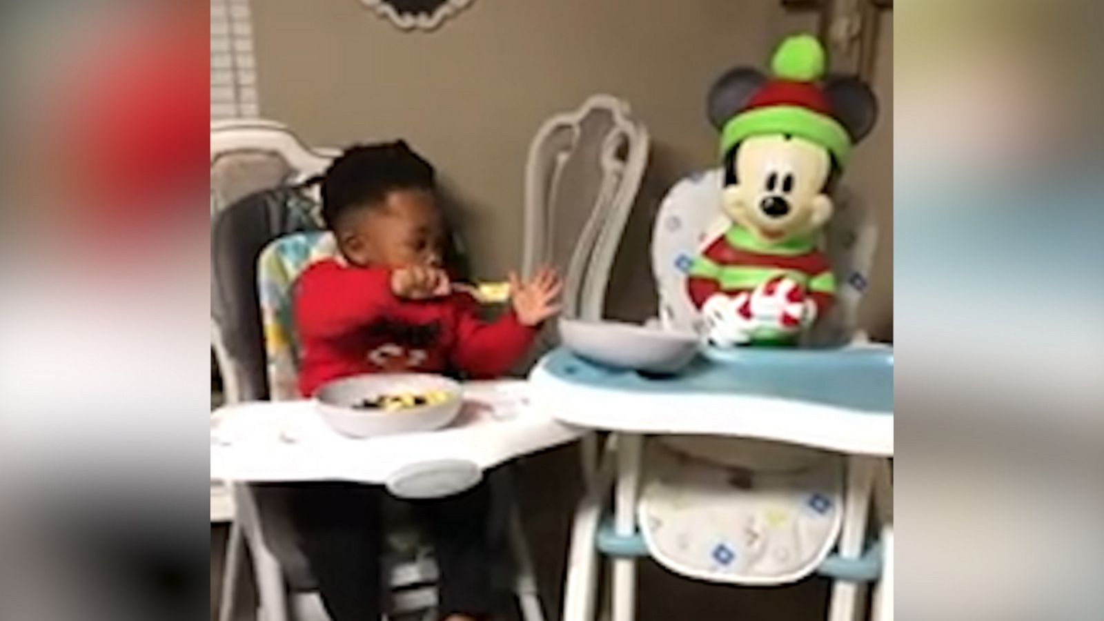 VIDEO: Generous toddler shares meal with Mickey Mouse