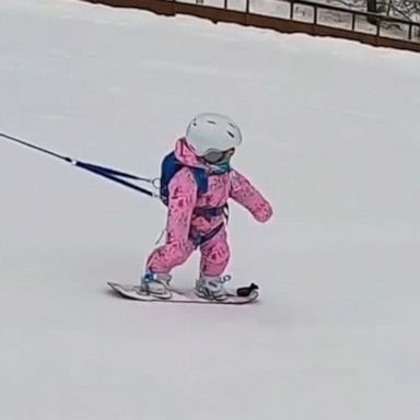 VIDEO: Tethered toddler snowboards like a pro