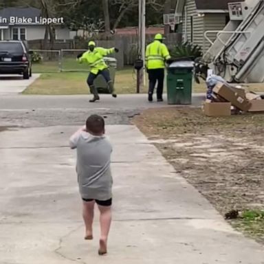 VIDEO: Kid has driveway dance party with sanitation workers