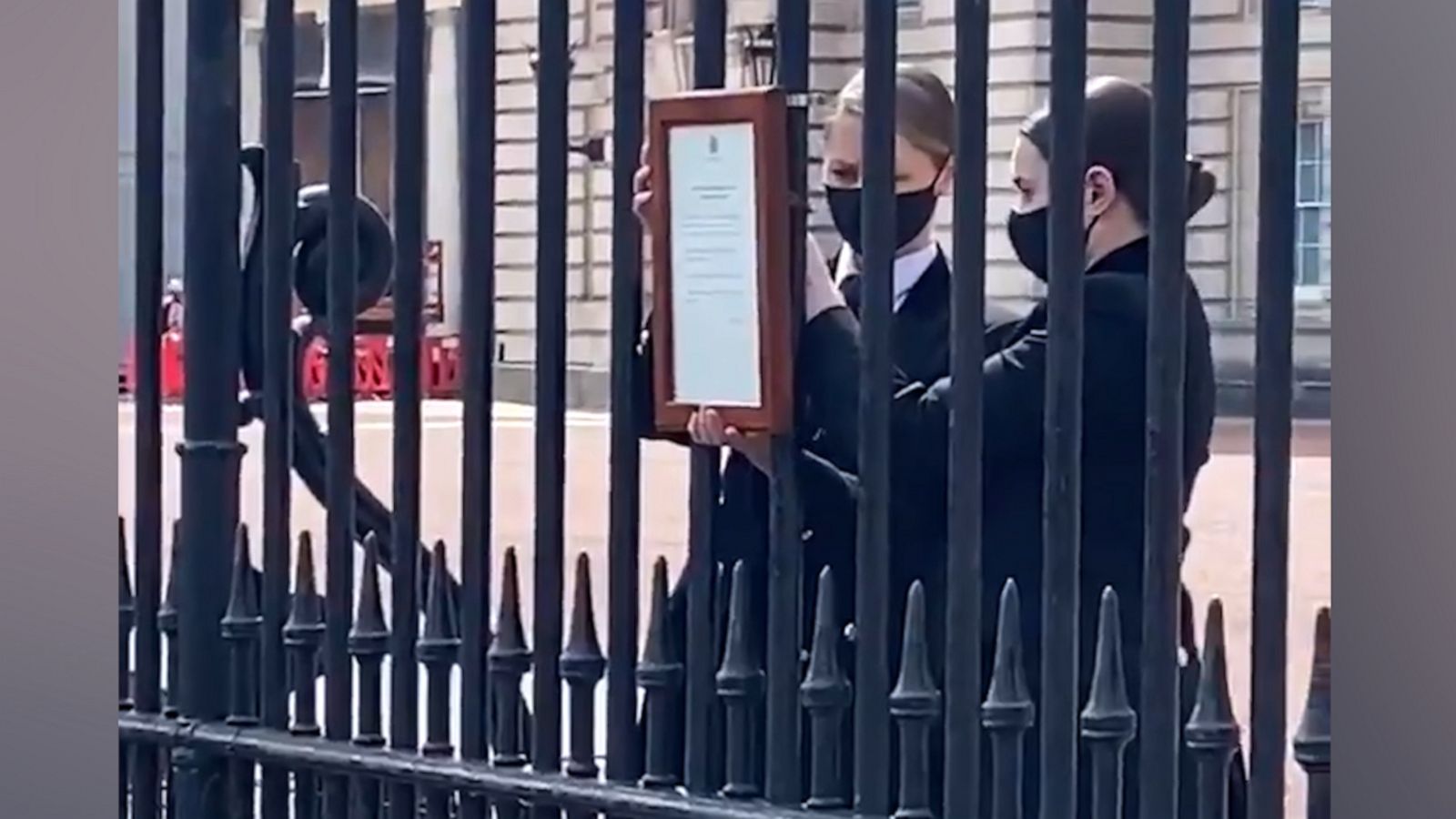 Plaque placed on Buckingham Palace railing following announcement of