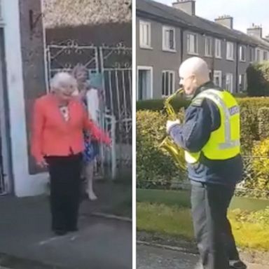 VIDEO: 100-year-old woman dances to police officer playing the saxophone for her birthday 