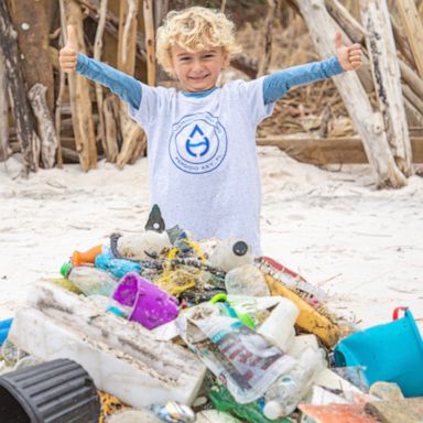 VIDEO: Little boy is on a big mission to keep his local beach clean