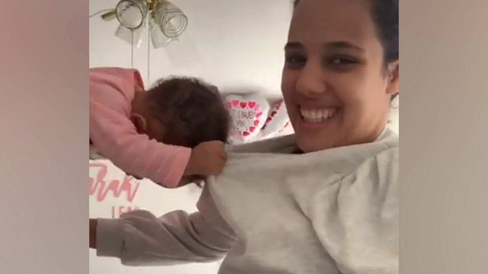 VIDEO: Clingy baby refuses to let go of mom