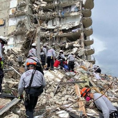 VIDEO: Rescue crews at building collapse continue to fight fires inside the debris