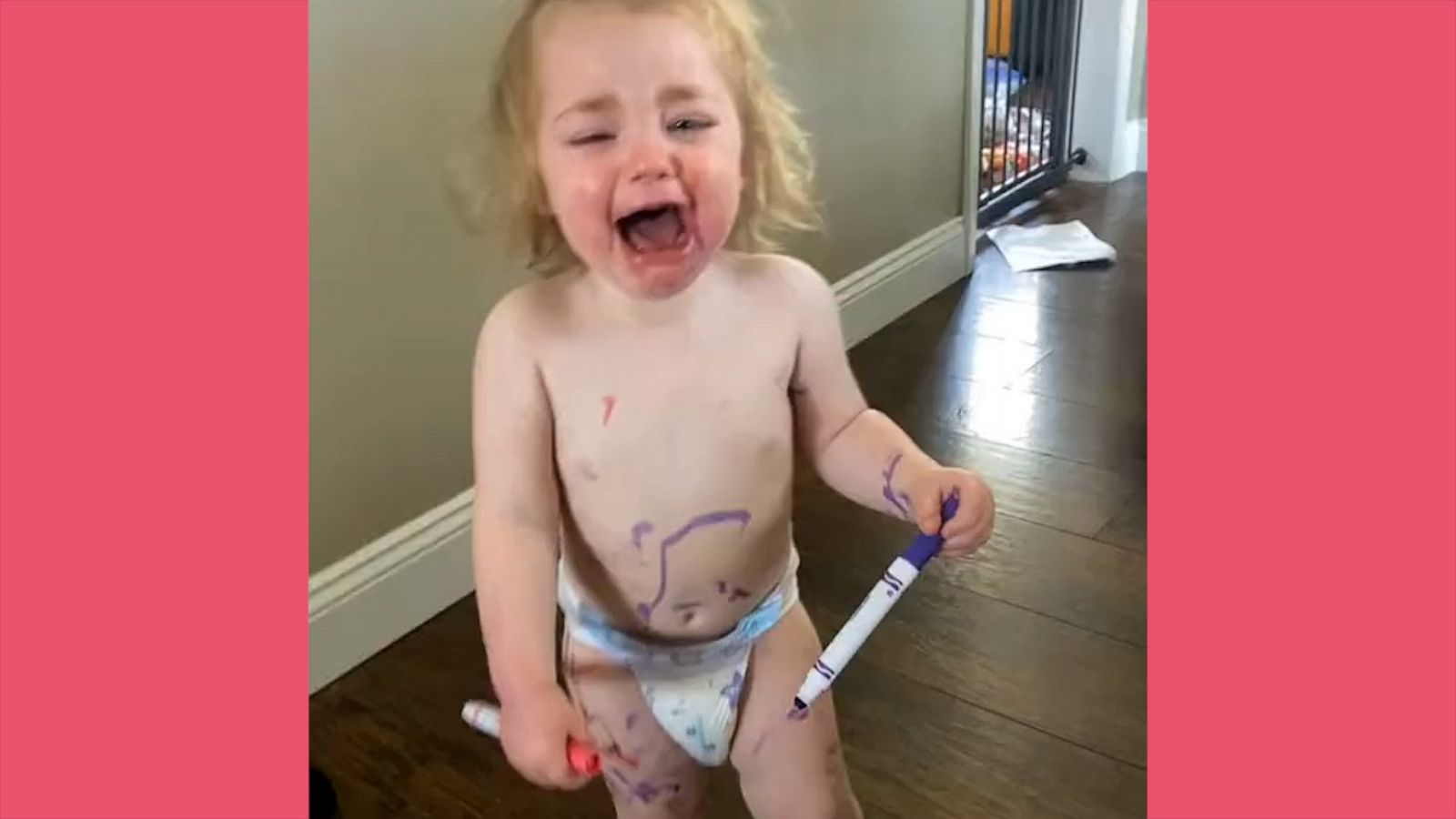 VIDEO: Toddler uses baby sis as a canvas