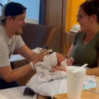 VIDEO: Newborn helps dad pop the big question to mom 