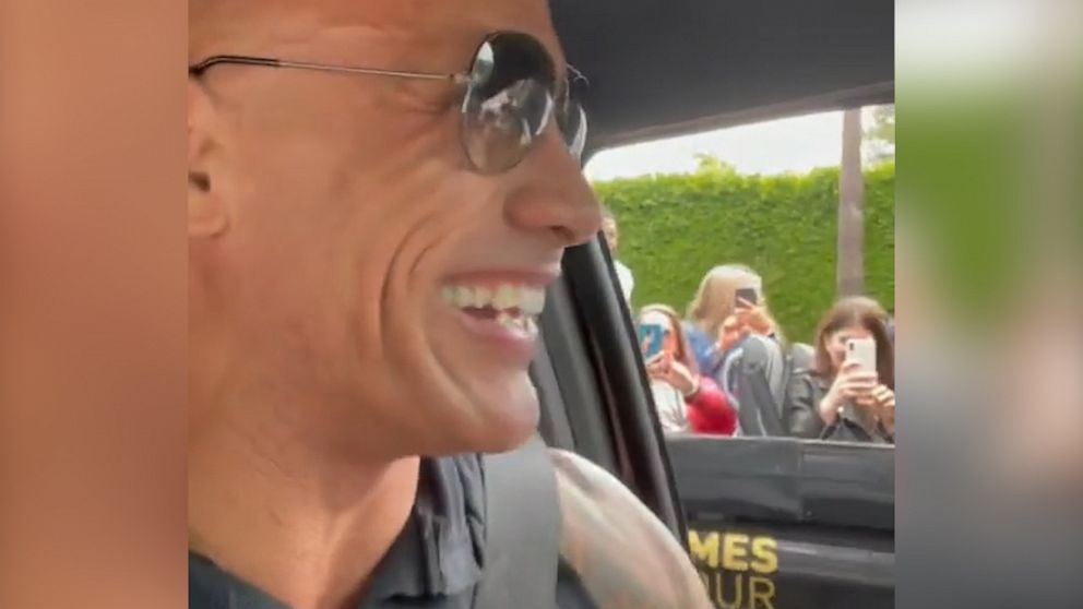 VIDEO: The Rock surprises Hollywood tour bus in his neighborhood