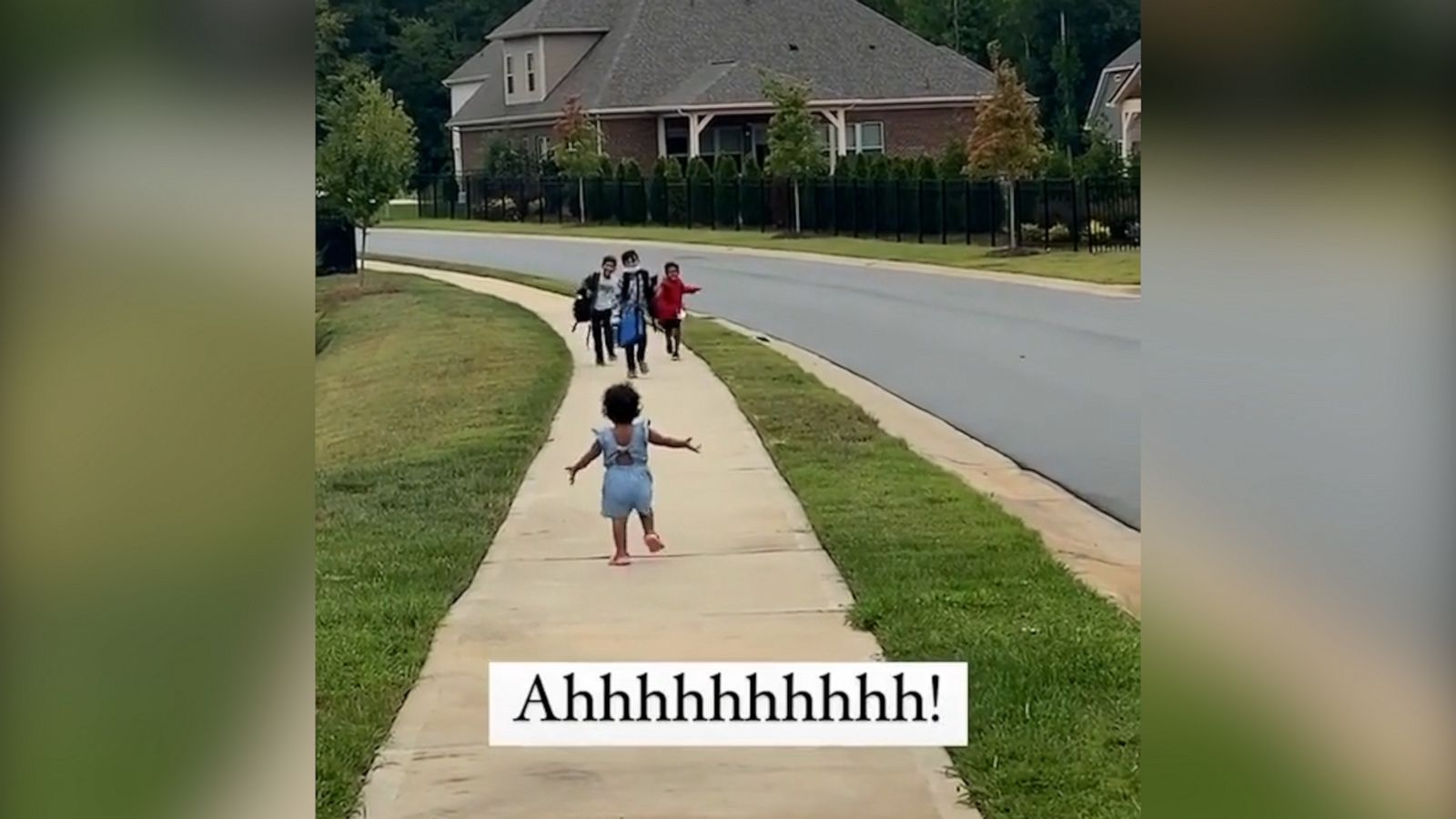 VIDEO: Little sis running to greet her big brothers after school is too cute for words