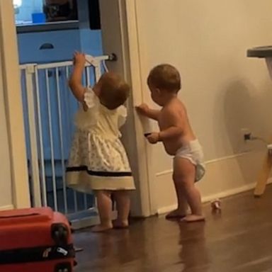 VIDEO: Clever toddlers sneak through baby gate