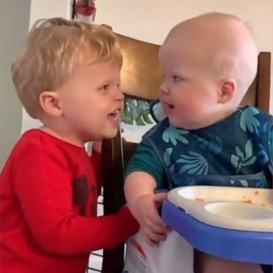 VIDEO: Toddler and baby brother become instant besties 