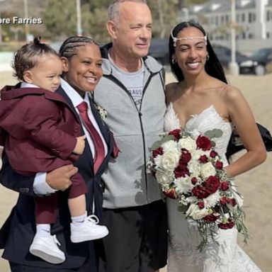 VIDEO: Tom Hanks crashes beach wedding