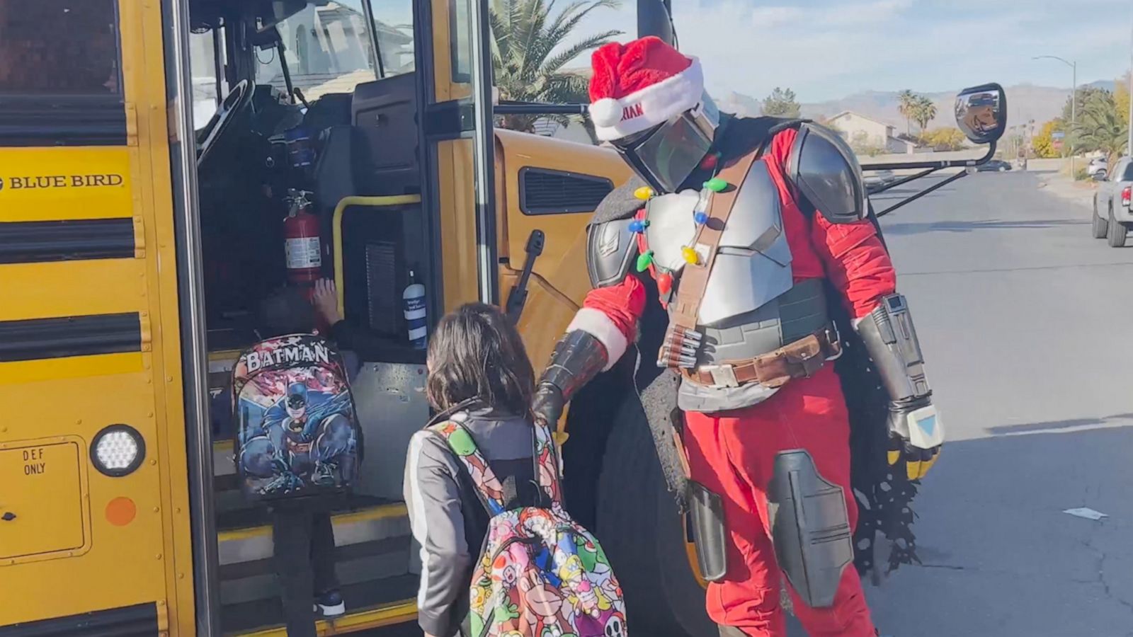 VIDEO: ‘Santalorian’ walks child battling brain cancer to school bus