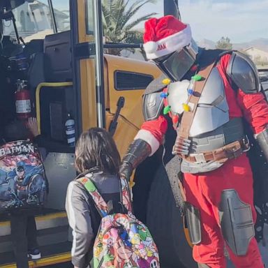 VIDEO: ‘Santalorian’ walks child battling brain cancer to school bus 