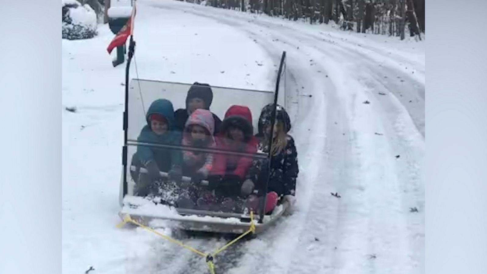 VIDEO: Dad transforms old golf cart roof into sled