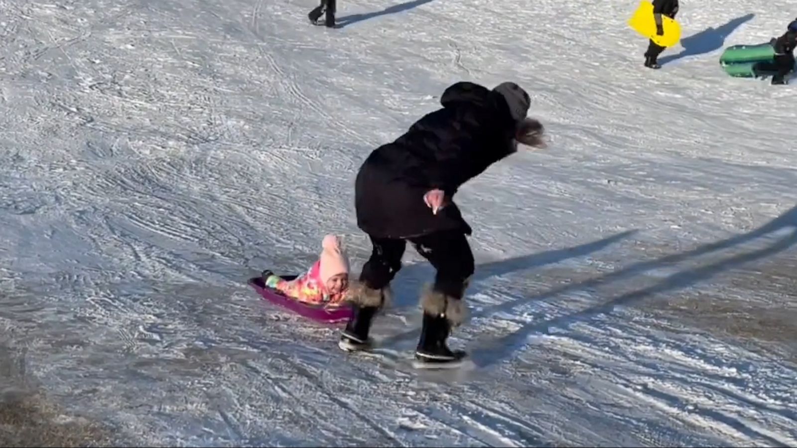 VIDEO: This mom is all of us trying to walk up a slippery slope