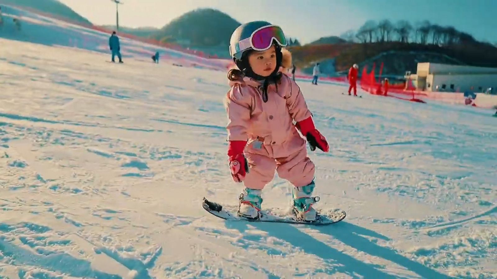 VIDEO: Determined toddler continues snowboarding after multiple falls