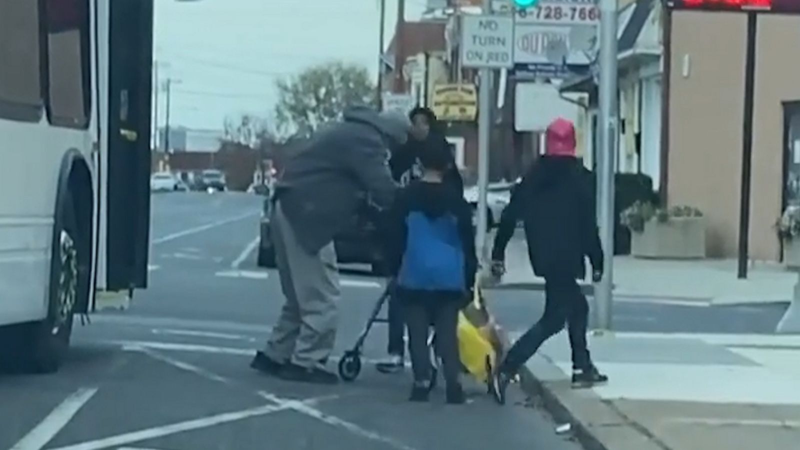 VIDEO: Kids help elderly man cross the street, then get a surprise