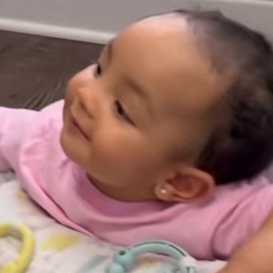 VIDEO: Baby admiring her dad while he plays video games is true love 