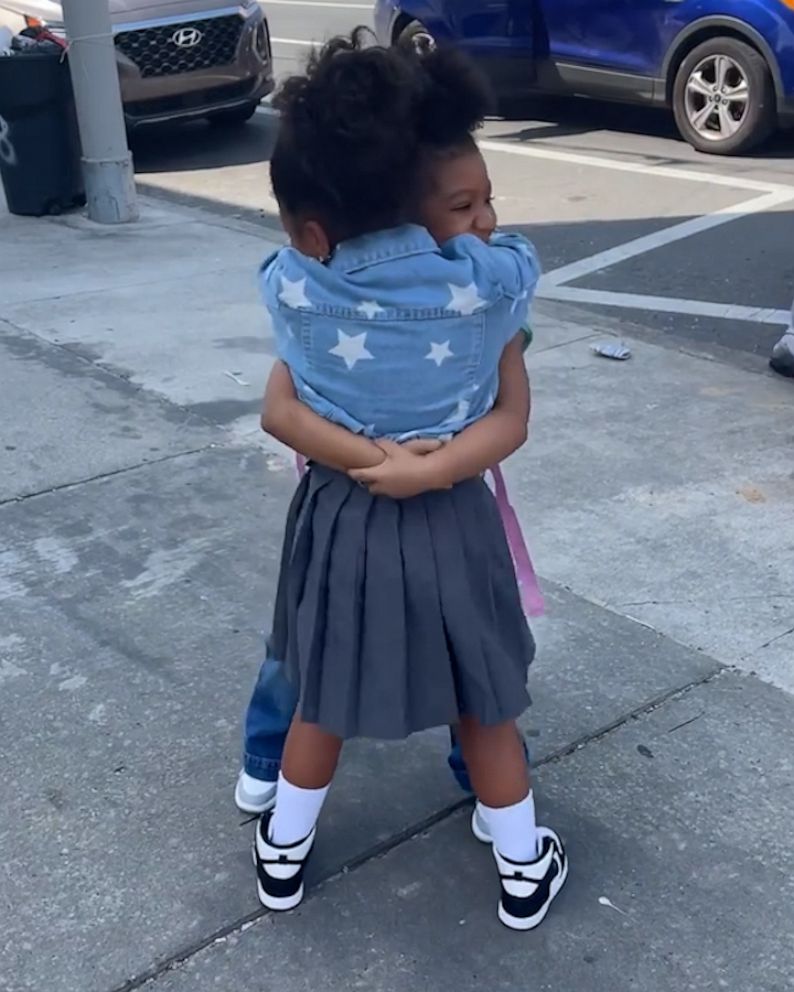 black kids hugging each other