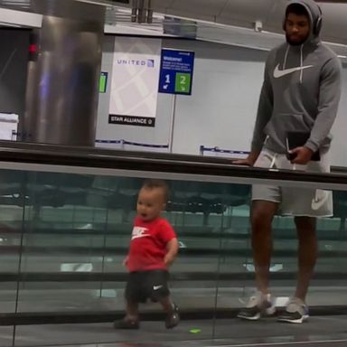 VIDEO: Dad tires out toddler on moving walkway before flight