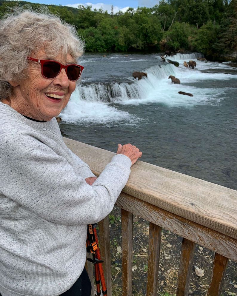 PHOTO: 92-year-old Joy Ryan gleefully watches bears catch fish at Katmai National Park and Preserve in Alaska.
