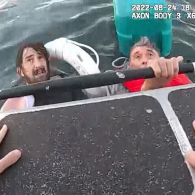 VIDEO: Police rescue father and son from sinking boat in Boston