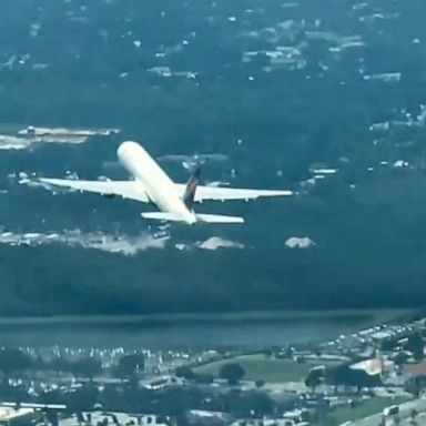 VIDEO: Close call between small plane and passenger jet