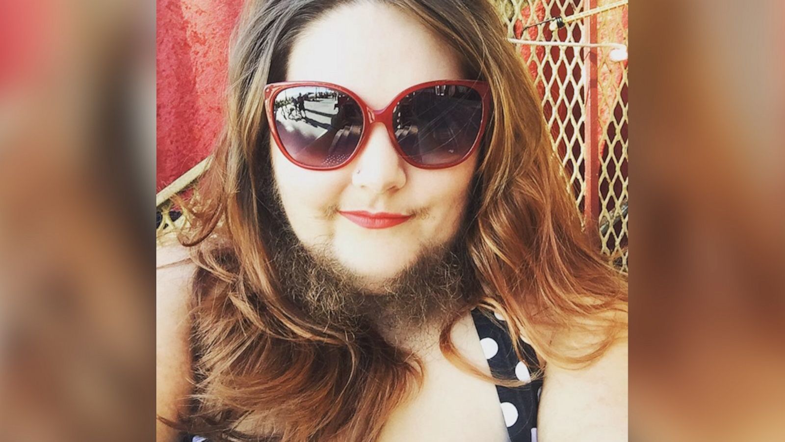 VIDEO: Woman ignores societal pressures and learns to love her facial hair